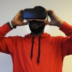 Game Changing Virtual Reality Console Hits the Market man-with-vr